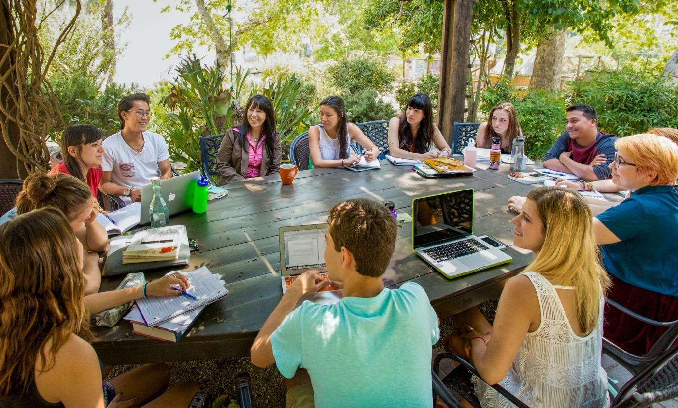 sociology class conducted in an outdoor classroom